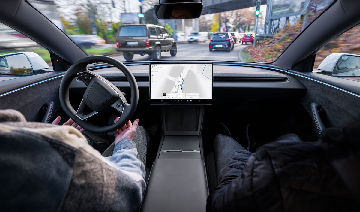 tesla fsd cockpit hands off